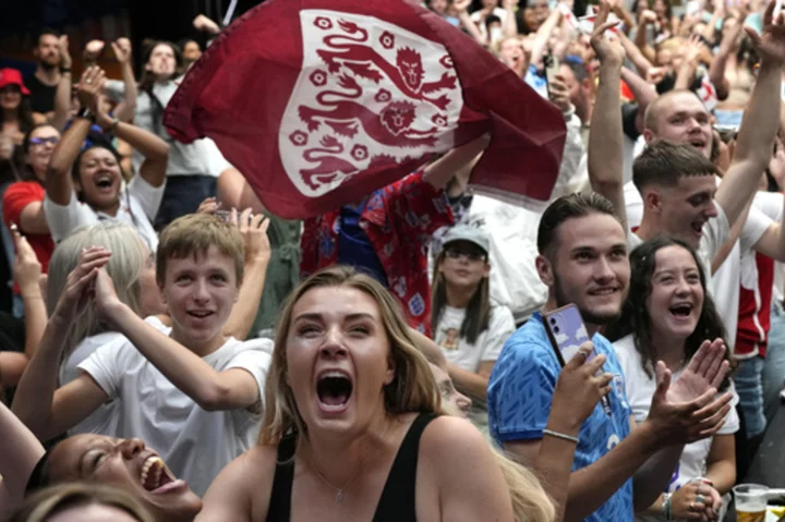 England fans back home celebrate their team's spot in the Women's World Cup final