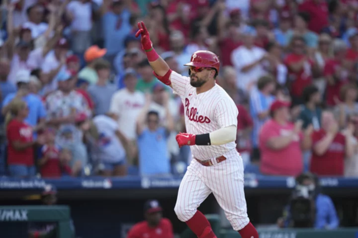 Schwarber homers twice to reach 30, Phillies top Nationals 8-4 in first game of doubleheader