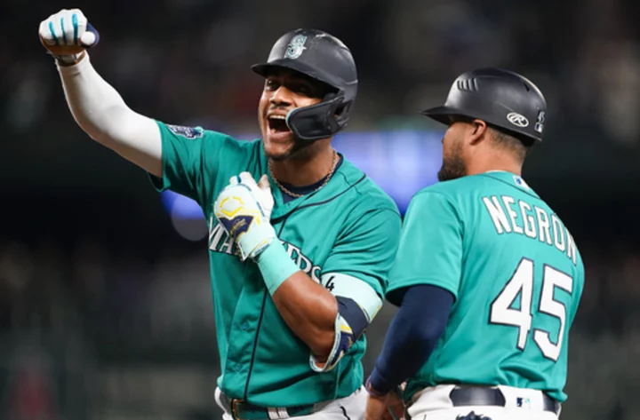 Mariners snap 4-game losing streak and gain ground in playoff race by blanking Angels 8-0