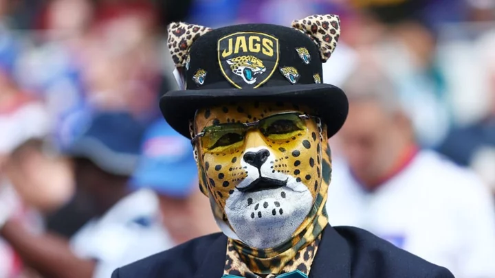 Proper English Gentleman Dressed as Jaguars Super Fan is a Jarring Image For Any American Football Fan