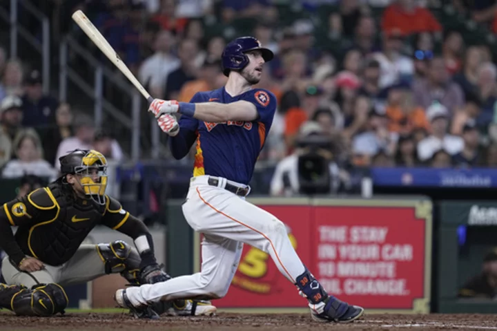 Tucker hits 2 RBI triples in an inning, Astros rout Padres 12-2