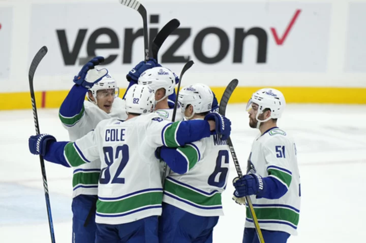 Canucks score 2 goals late, top Panthers 5-3 to snap a 2-game losing streak