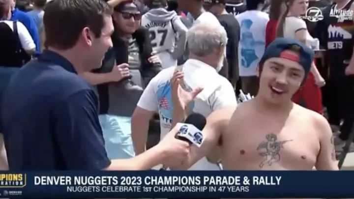 Shirtless Nuggets Fan Gives Incredible Interview Recounting How He Caught And Chugged a Beer From Christian Braun