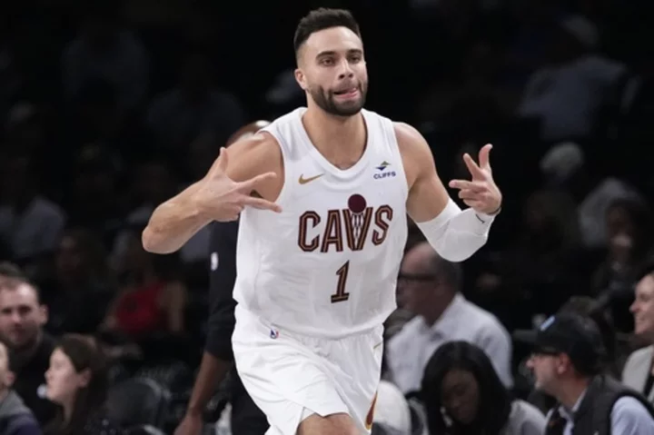 Donovan Mitchell scores 27 points as Cavaliers top Nets 114-113 in season opener