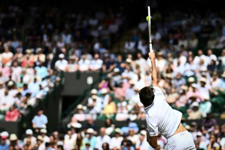 Medvedev into first Wimbledon quarter-final after Lehecka quits