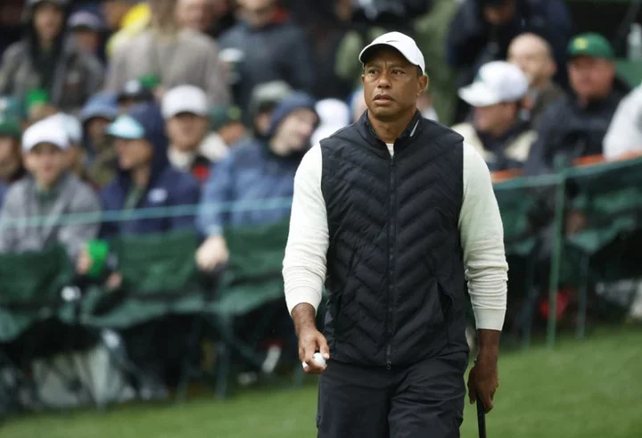 Golf-Woods withdraws from U.S. Open while recovering from surgery