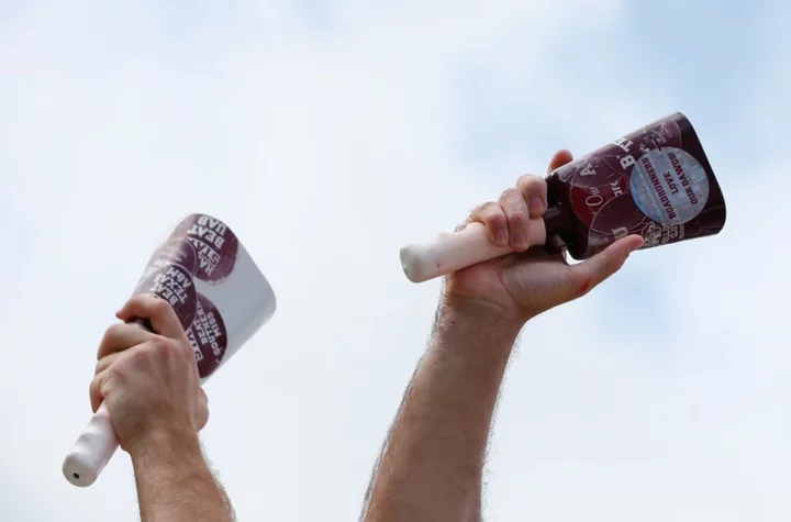 Why do Mississippi State fans ring cowbells at football games?