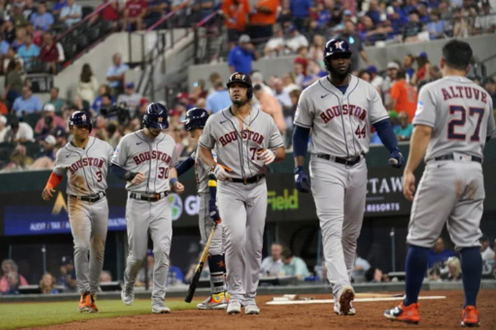 Abreu hits grand slam and 3-run shot, Astros complete sweep with 12-3 win over Rangers