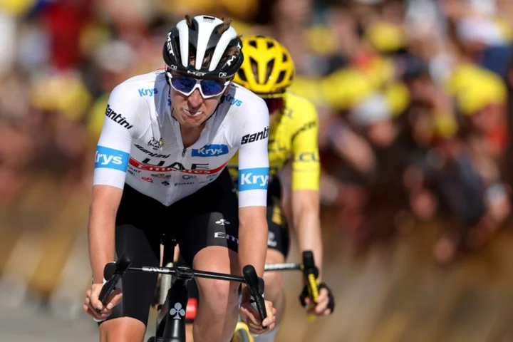 Rodriguez wins Alpine stage as Vingegaard retains slim Tour lead