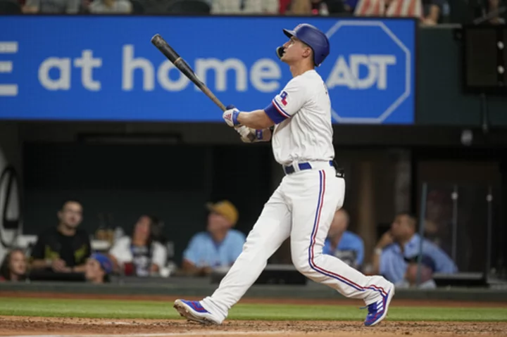 Seager homers twice and drives in 5 runs, AL West-leading Rangers beat slumping Angels 7-3