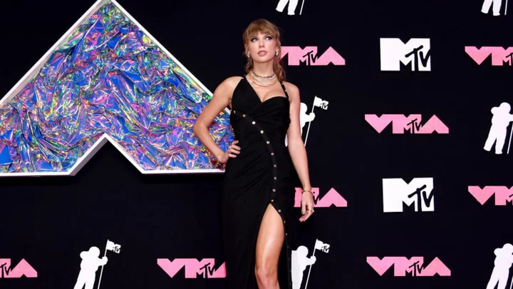 Roundup: Taylor Swift, Travis Kelce Are Official; WGA Reaches Deal With Studios; Dolphins Drop 70 On Denver
