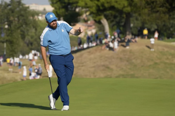 Shane Lowry releases emotions and silences critics in Ryder Cup win before playing cheerleader role