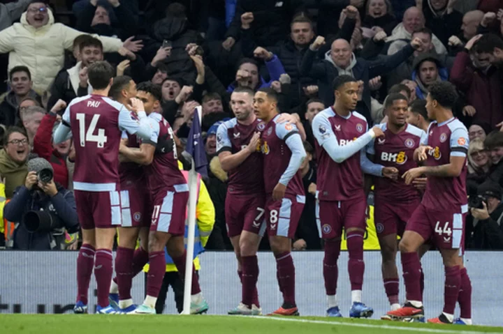 Aston Villa beats injury-hit Tottenham 2-1 to move just 2 points off the lead in the Premier League