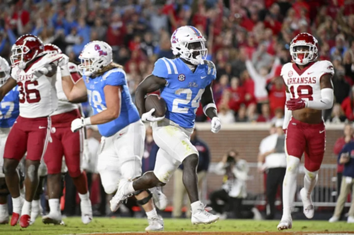 No. 16 Mississippi scores 10 points in fourth quarter to rally for 27-20 win over Arkansas