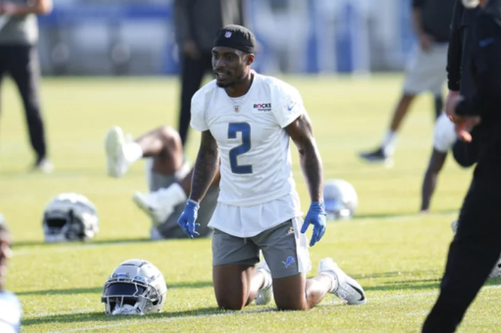 Lions DB C.J. Gardner-Johnson carted off field with injury after grabbing right knee