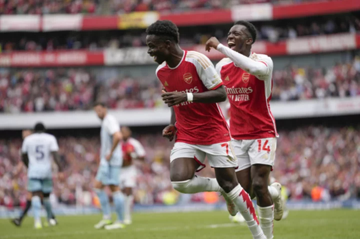 Arsenal beats Forest 2-1 in Premier League opener delayed by ticketing malfunction at stadium