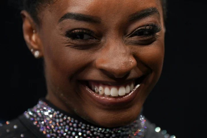 Gymnastics great Biles targets 2024 Paris Games