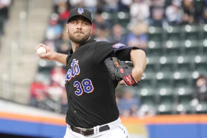 Megill solid in career-long outing, Mets hang on to edge Phils