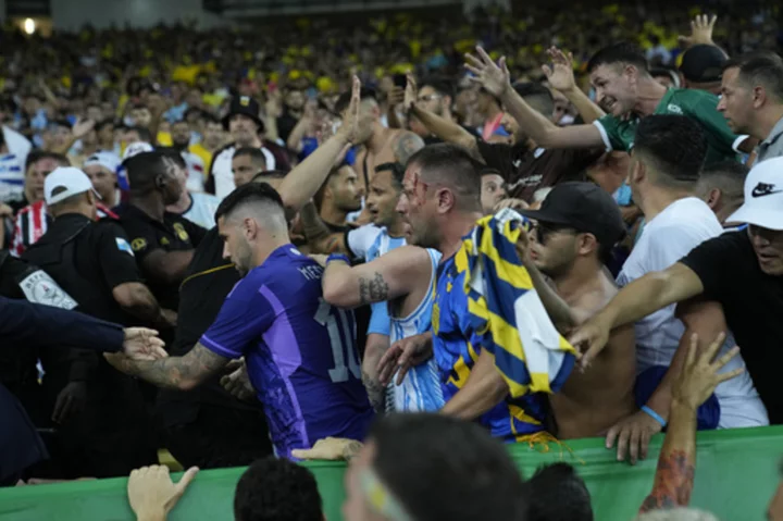 Argentina and Brazil charged by FIFA after fan violence delays World Cup qualifying game at Maracana