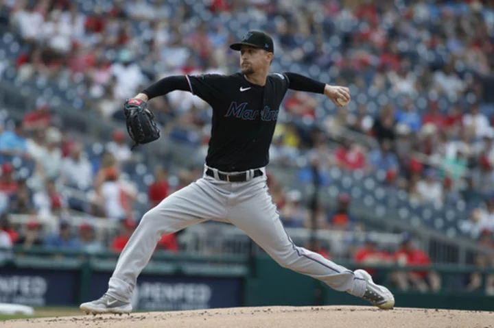 Garrett throws 6 solid innings, the Marlins beat the Nationals 5-2 for their 3rd straight win