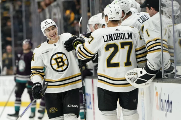 Bruins rally past Ducks, extend season-opening win streak to five