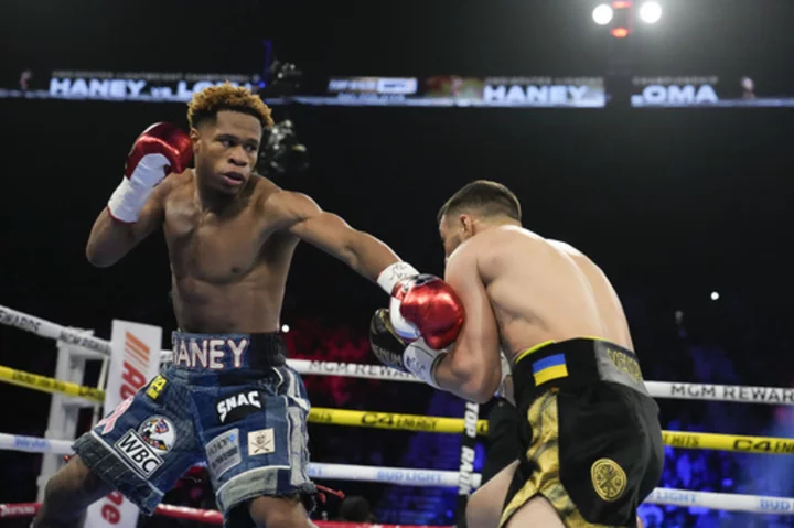 Haney retains lightweight titles with unanimous decision over Lomachenko