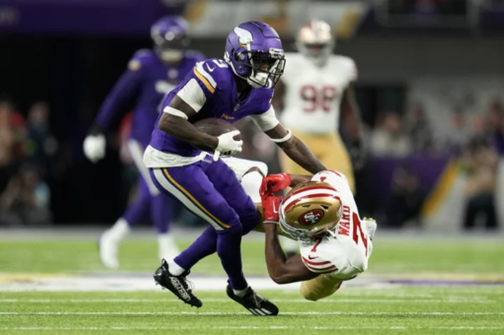 Vikings outlast 49ers 22-17 with 2 touchdown catches from Addison and 2 interceptions by Bynum