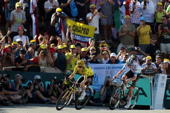 Vingegaard retains Tour lead as Poels wins in Alps