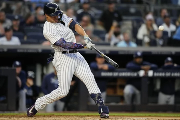 Stanton homers and drives in 4 to power Cole, Yankees to 7-2 win over McClanahan and Rays