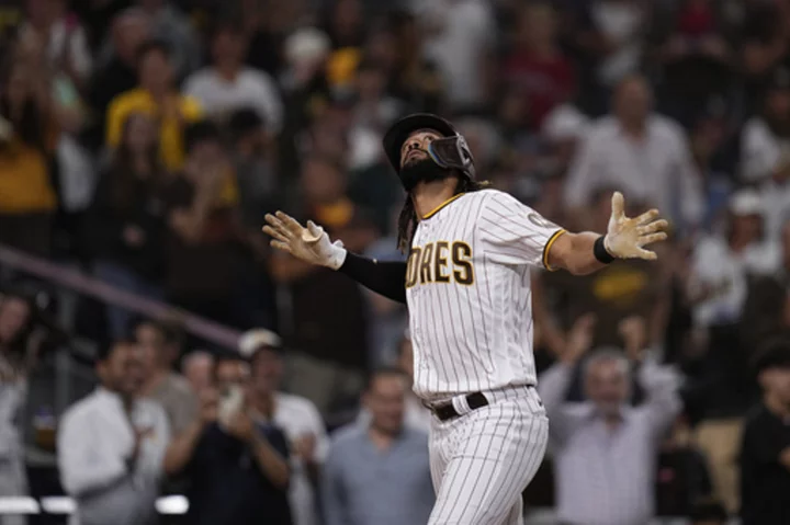 Tatis homers and rookie Avila gets his 1st win as the Padres beat the Phillies 8-0