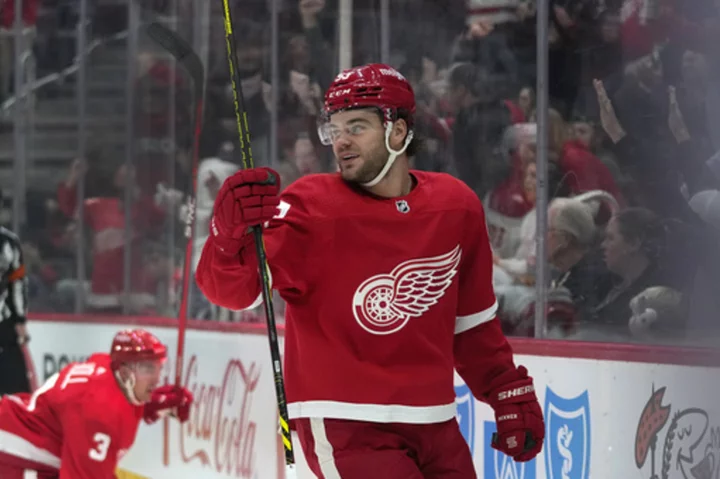 DeBrincat notches hat trick, Red Wings win fifth straight by downing Flames 6-2