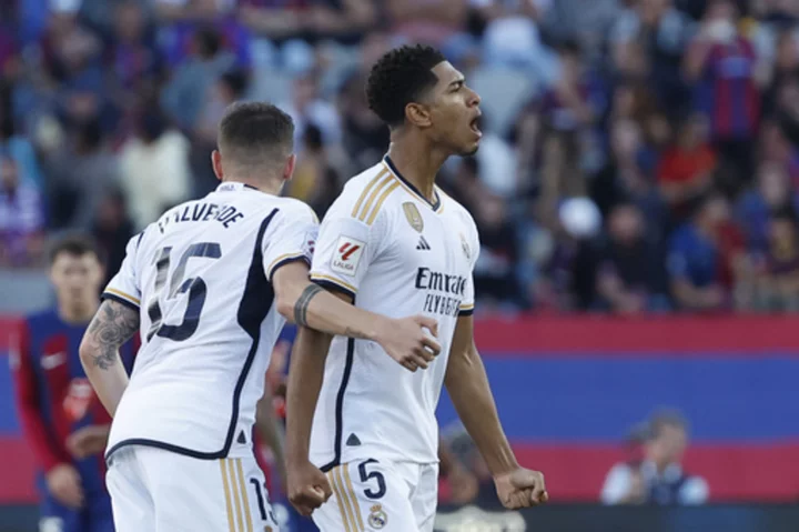 Bellingham's stoppage-time winner gives Real Madrid 2-1 victory at Barcelona in his 1st 'clasico'