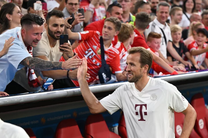 Harry Kane makes debut as Bayern Munich suffer defeat in German Super Cup