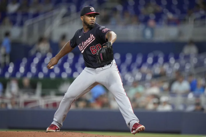 Adon leads Nationals over Marlins 7-4 for Washington's 10th win in 13 games