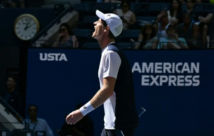 Murray slides to heavy US Open defeat against Dimitrov
