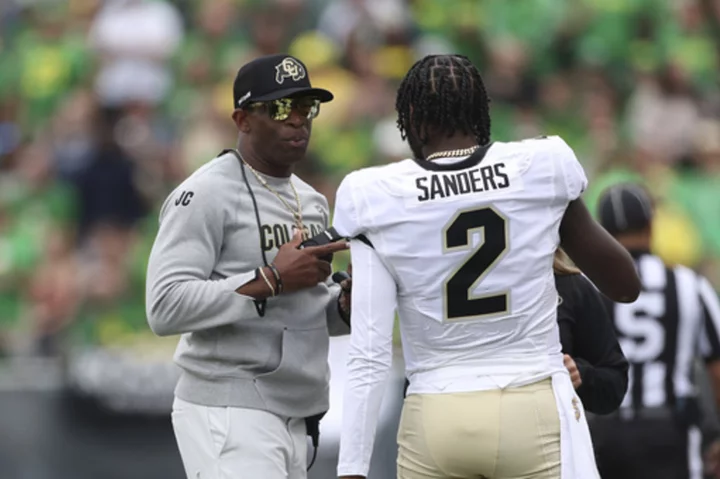Deion Sanders tunes out detractors and turns the page on Colorado's lopsided loss to Oregon