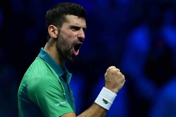 Djokovic sweeps past Alcaraz to continue record ATP Finals bid