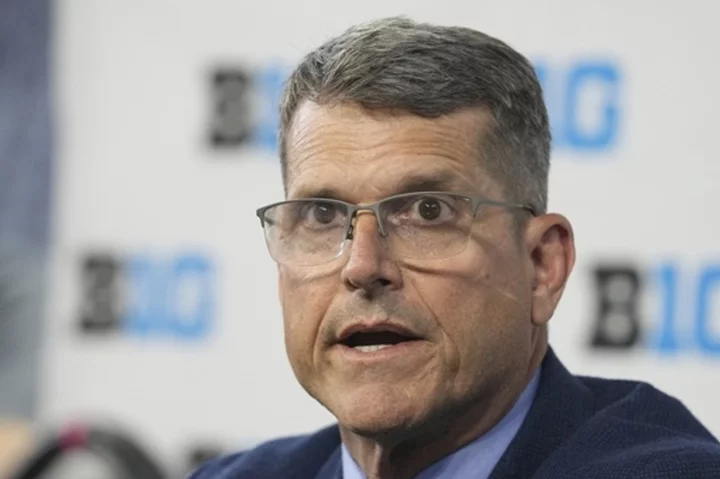 NCAA committee fails to approve deal with Michigan, leaving coach Harbaugh's status uncertain