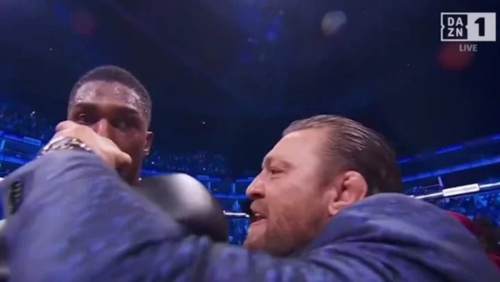 Anthony Joshua takes swig of Conor McGregor’s Irish stout after Helenius knockout