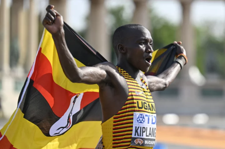 Victor Kiplangat of Uganda pulls away late to win men's marathon on last day at worlds