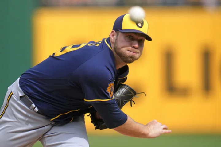 Burnes takes perfect game into the sixth, Yelich homers as Brewers hold off Pirates 11-8