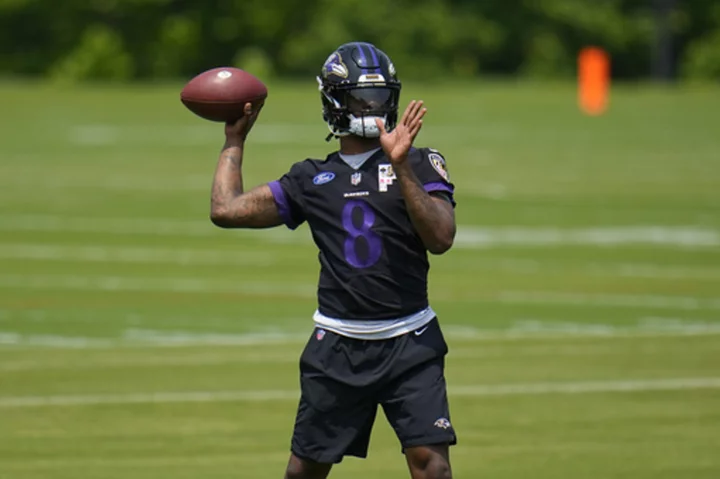 Lamar Jackson at voluntary practice for Ravens after skipping last year's