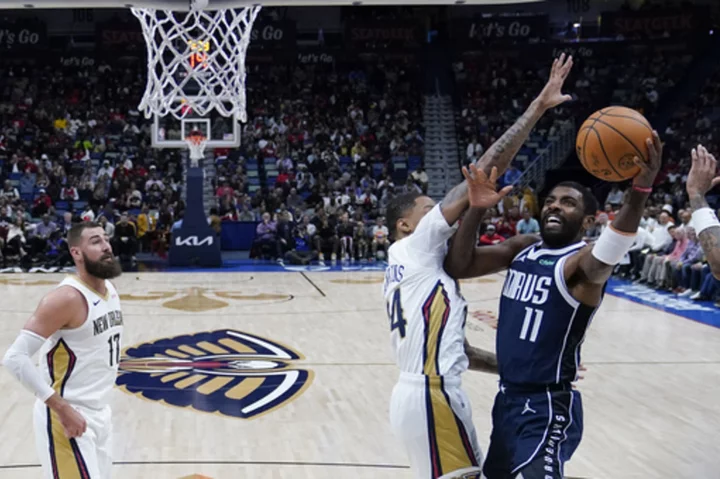 Irving hits 7 of 10 3-pointers, scores 35 points in Mavericks' 136-124 victory over Pelicans