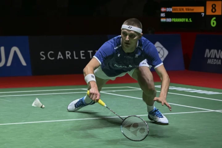 Axelsen powers into Indonesia Open final, An crashes out