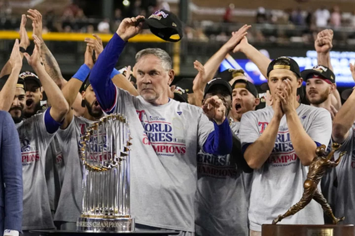 Security prevents Rangers from celebrating in Chase Field pool after winning World Series