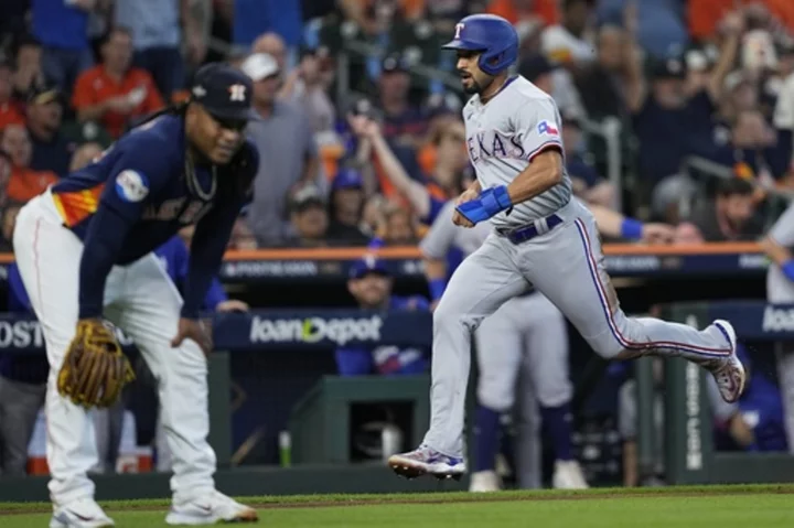 Rangers build big early lead off Valdez, hold on for 5-4 win over Astros to take 2-0 lead in ALCS