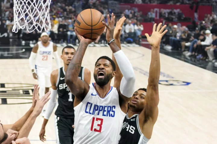 Leonard and George school Wembanyama in rookie's 1st road game, lead Clippers over Spurs 123-83