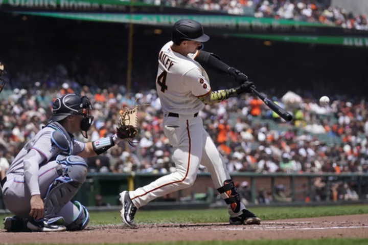 Bailey hits 1st big league homer, squeezes in a run, Giants beat Marlins 7-5