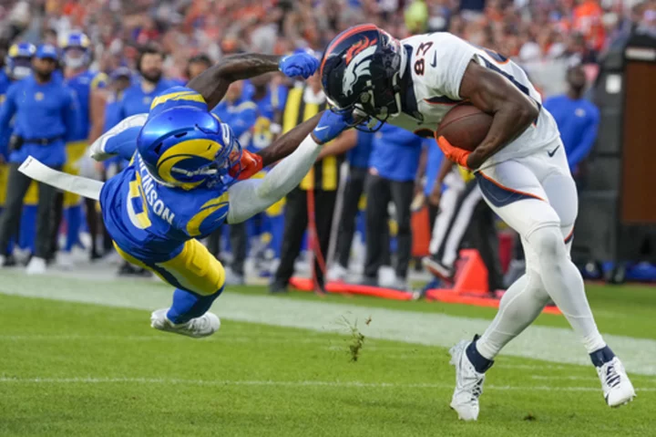 Rams' Tre Tomlinson disqualified for facemask tackle of Broncos' Marvin Mims