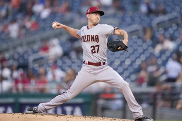 Davies earns 1st win in more than a year as NL West-leading Diamondbacks top Nationals 6-2